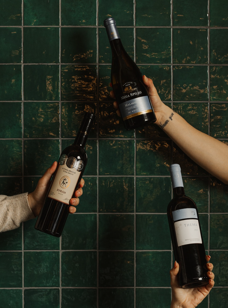 Wine bottles against tiles